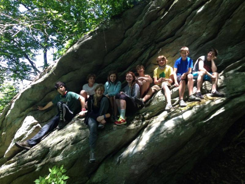 Regular Camp B campers on top of a boulder at Grandmother in Boone, NC
