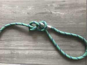 well-dressed figure eight knot pushing working end through